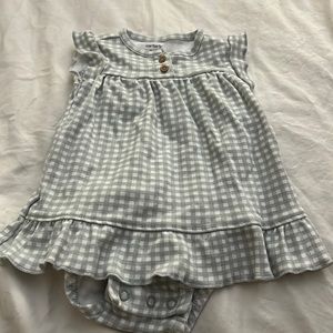 Green and whit checkered romper dress.